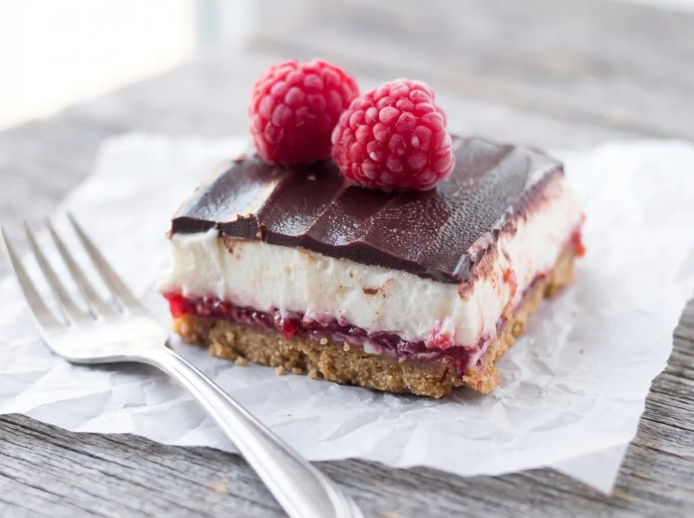 No Bake Raspberry Cheesecake Bars with Chocolate Drizzle